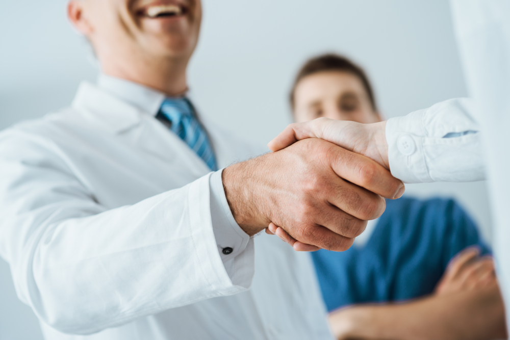 doctor shaking a hand